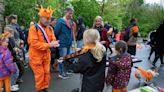 Orange crush: Boats packed with revelers tour Amsterdam canals to celebrate the king’s birthday