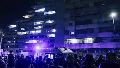 Two dead and 13 injured as walkway collapses in Naples