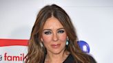 Elizabeth Hurley Makes Casual Jacket Look Risqué With Low-Cut Zipper and Platform Heels