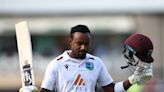 West Indies century-maker Hodge glad to survive 'brutal' Wood battle