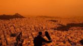 Impresionantes imágenes de nube de polvo del Sahara que tiñó naranja el cielo de Atenas | Teletica