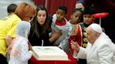 Children help Pope Francis mark 87th birthday