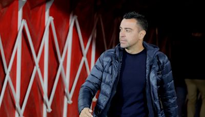 Xavi reaches 100 games at the helm of Barca with championship ambitions