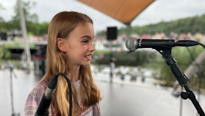 Competition-winner, 11, opens Latitude with poem