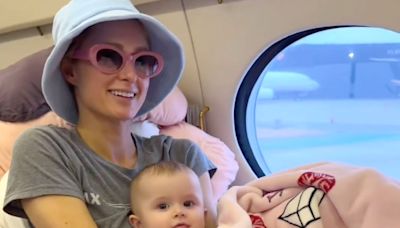 Paris Hilton Shares Adorable Videos of Daughter London Wrapped in a ‘That’s Hot’ Blanket Inside a Jet on Family Vacation