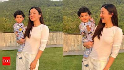 Gauahar Khan asks paps not to shout and startle son Zehaan as they pose together | - Times of India