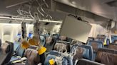 Photos show Singapore Airlines passenger on stretcher and debris as one killed in turbulence