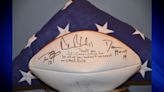 Lost football signed by Tom Brady, put on eBay, returned to local plumbing company