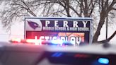 Principal of Perry High School in Iowa tried to distract shooter so students could escape, his daughter says