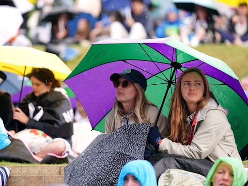 ‘Terrible’ weather blamed for low Wimbledon crowds as UK set for downpours