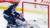 Morrissey has 2 goals, assist as Jets outlast Oilers 7-5