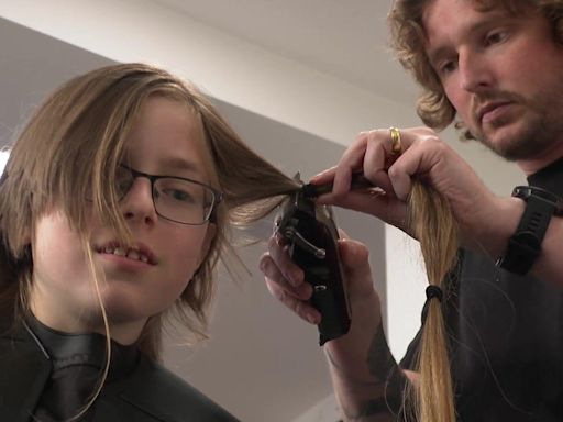 Boy, 11, has first haircut to help cancer patients