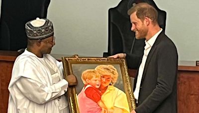 Prince Harry Gifted Special Paintings Honoring Princess Diana and His Wedding Day on Solo Outing in Nigeria