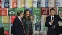 Melinda French Gates, pictured in 2018 with Bill Gates (left) and French President Emmanuel Macron, has pledged to use her fortune to help women and families