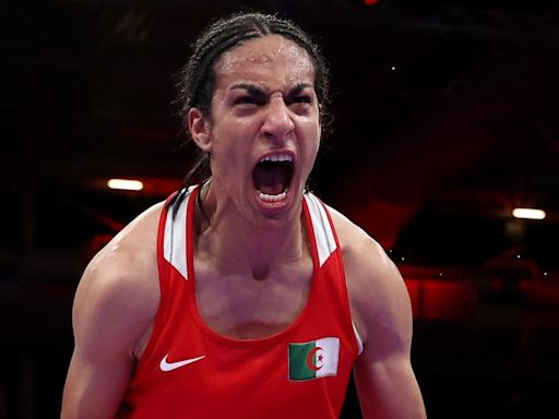 Gender-row boxer Imane Khelif cries ‘I am a woman’ after guaranteeing Olympic medal