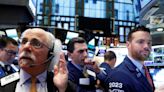 US stocks fall as Fed comments and new data raise fear of more rate hikes