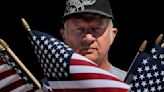 St. Peters man plants thousands of Memorial Day flags at Jefferson Barracks