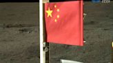 Craft unfurls China's flag on the far side of the moon and lifts off with lunar rocks to bring home