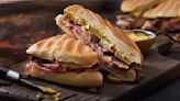 The Cheese Swap That'll Take A Classic Cuban Sandwich To The Next Level