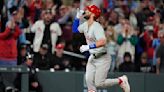 Bryce Harper hits 3-run homer in 9th-inning rally, Phillies beat Rockies 8-4