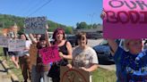 Students hold women's rights rally across from Madison High School