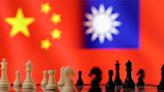 China pressures Taiwan with trade accusations and warplanes a month before election