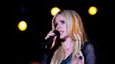 Avril Lavigne looks 'too gorgeous' in photos featuring potential new lyrics