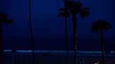 Bioluminescent waves crashing on the Southern California shoreline in images