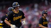 Reynolds extends hit streak to 22 games with a 2-run homer and Pirates beat Reds 9-5