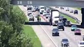 Truck hauling crane hits Enterprise Road overpass at I-4, backing up traffic for 7 miles