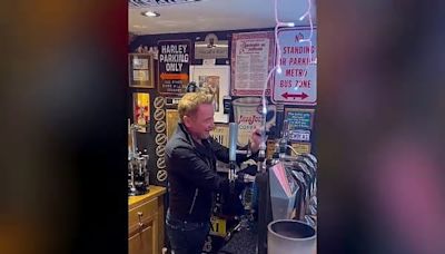 Michael Flatley pours pints of Guinness in Nicky Byrne’s Dublin home bar