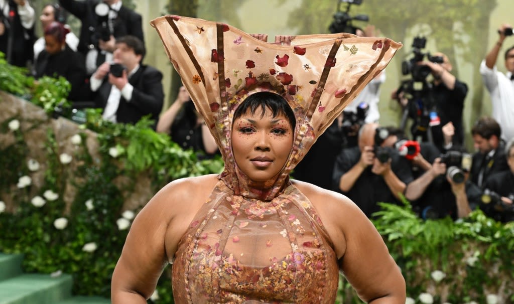Lizzo Gets Earthy in Structural Gown and Headpiece for Met Gala 2024 Red Carpet