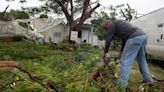 Hurricane Ernesto knocked out power to half of Puerto Rico and is strengthening as it heads toward Bermuda