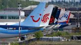 Boeing's financial woes continue, while families of crash victims urge US to prosecute the company