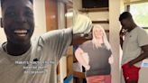 A college freshman was 'shocked' after his parents put posters of themselves in his room, including a life-size cutout of his mother