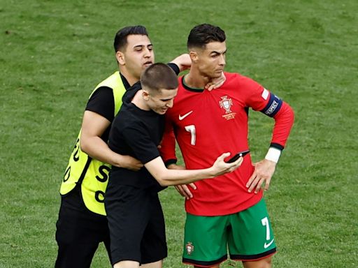 Euro 2024 security bulked after pitch invaders aim for Ronaldo selfies