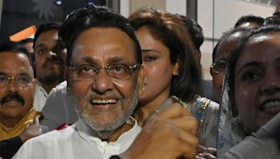 Out on bail, Nawab Malik attends Ajit Pawar's meeting, sparks speculation
