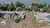 Iowa floodwaters breach levees as even more rain dumps onto parts of the Midwest