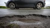 Britain's pothole shame with crumbling roads costing £14.4bn a year