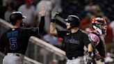 Hampson pega jonrón en la 11ma; Marlins vencen 8-5 a Nacionales