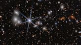El telescopio Webb capta la fusión de agujeros negros más lejana y primitiva hasta ahora