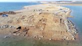 Ancient city with ‘massive’ palace emerges from lake in drought-stricken Iraq