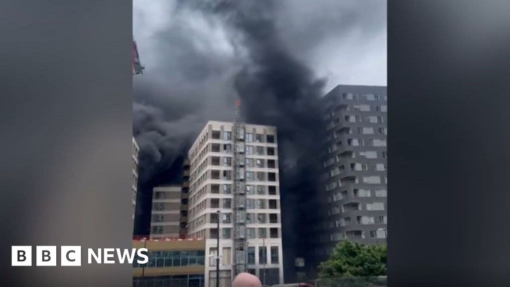 Canning Town: Person rescued from fire at construction site