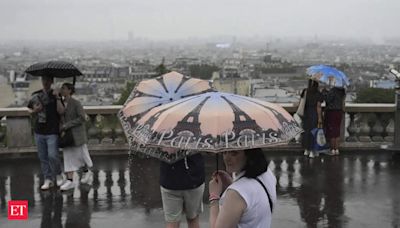 Pouring rain disrupts Olympic Games after drenched opening ceremony - The Economic Times