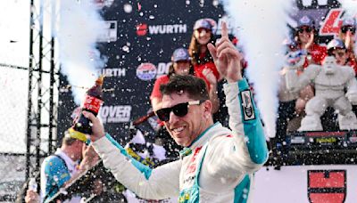 Denny Hamlin holds off Larson late to win NASCAR Cup race at Dover Motor Speedway