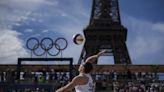 At the Olympic beach volleyball venue, the Eiffel Tower stars in a très French show