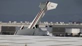 Plane crashes through roof of hangar at Long Beach Airport