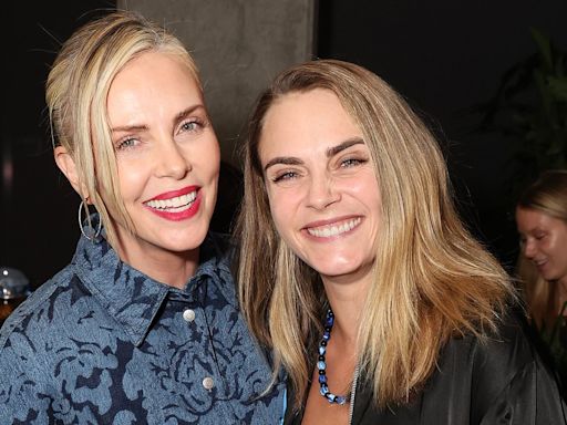 Charlize Theron joins Cara Delevingne at Netflix screening in LA