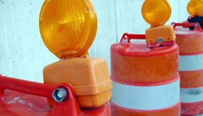 One lane road closure with temporary signal lights will begin on Blue River Bridge