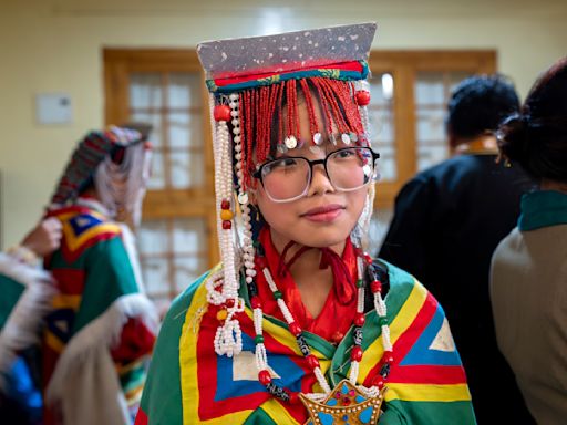 Hundreds of mostly exiled Tibetans celebrate the Dalai Lama's 89th birthday in India's Dharamshala